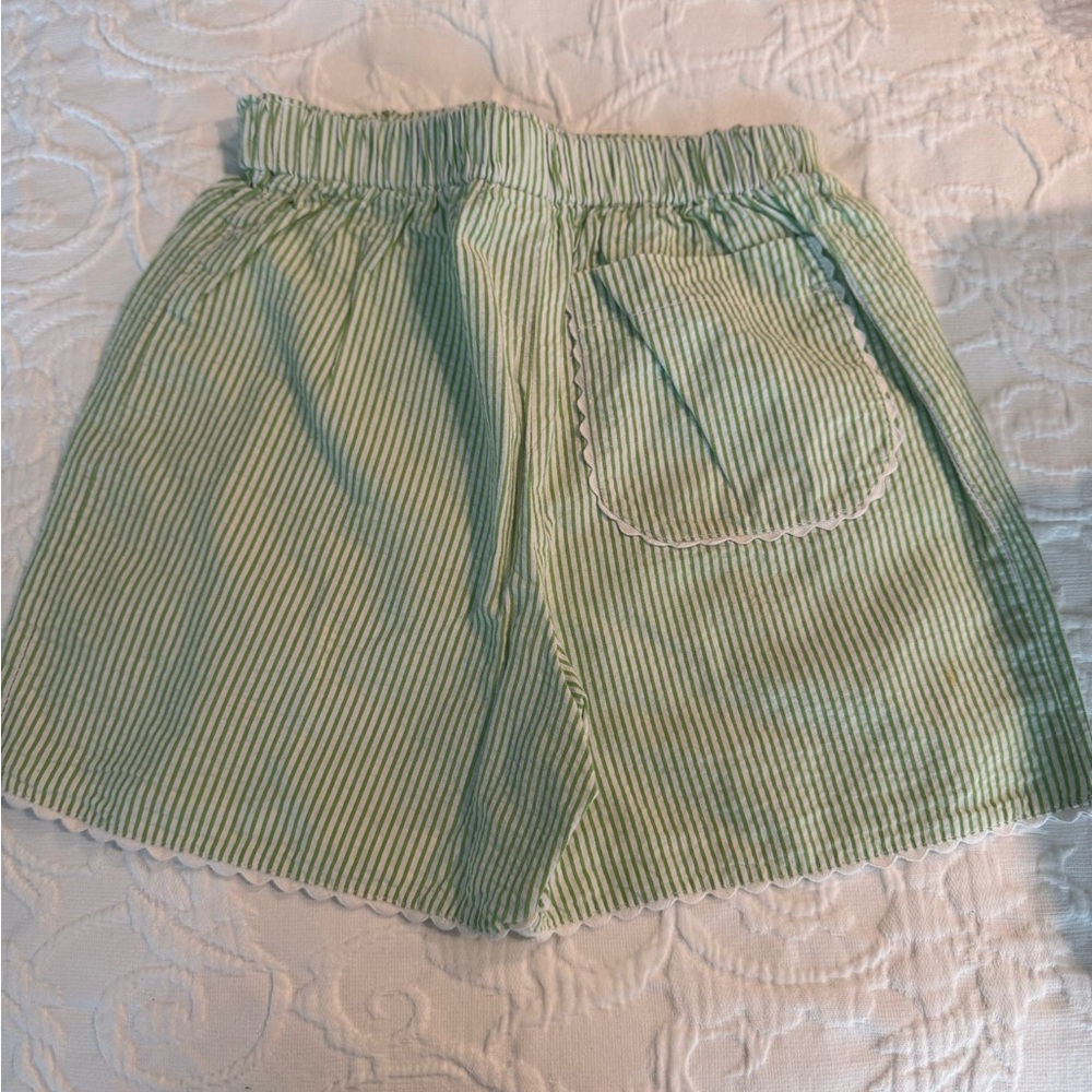 Lime, green, and white Bella Bliss shorts. Size 7. Adorable white trim at bottom
